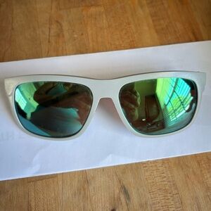 Costa “Baffin” Sunglasses. Net light gray frame, Copper Green Mirror 580G